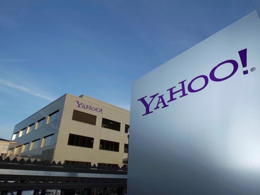 A Yahoo logo is pictured in front of a building in Rolle, 30km east of Geneva, Dec 12, 2012. Photo: Reuters