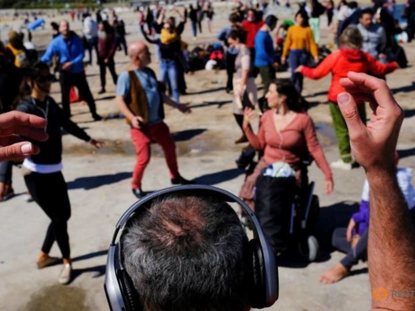 Ravers feel the music at socially distanced silent disco in Barcelona Ravers feel the music at socially distanced silent disco in Barcelona