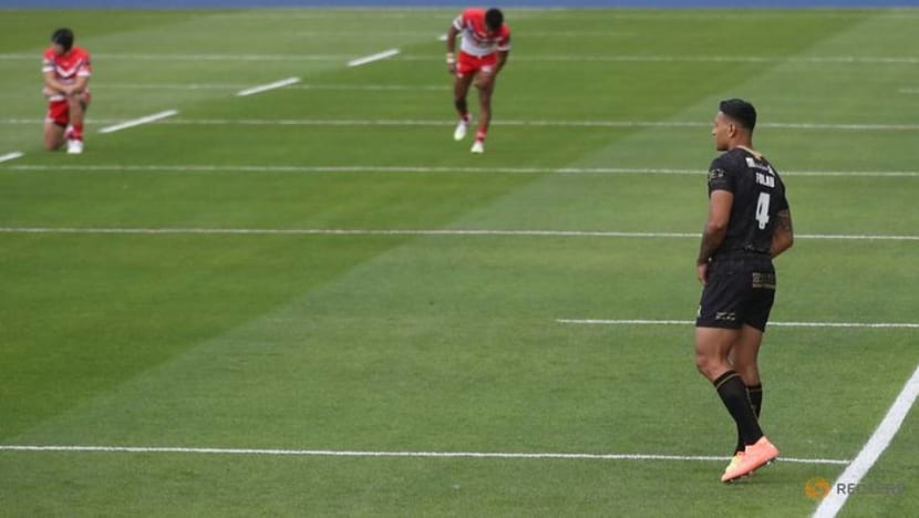 Rugby: Folau remains standing as team mates kneel for Black Lives Matter Rugby: Folau remains standing as team mates kneel for Black Lives Matter