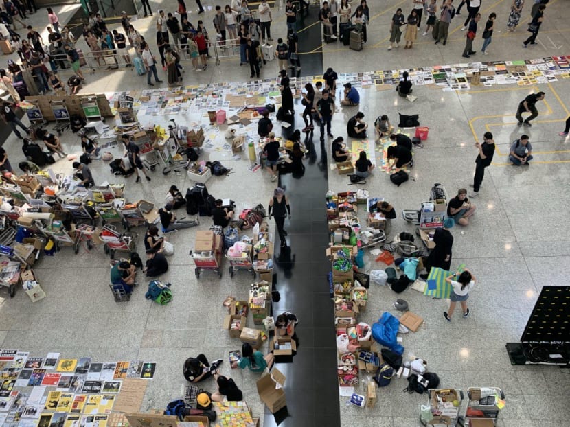 The scene at Hong Kong airport’s arrival hall on Sunday (Aug 11) morning, with more protesters set to join in the afternoon.