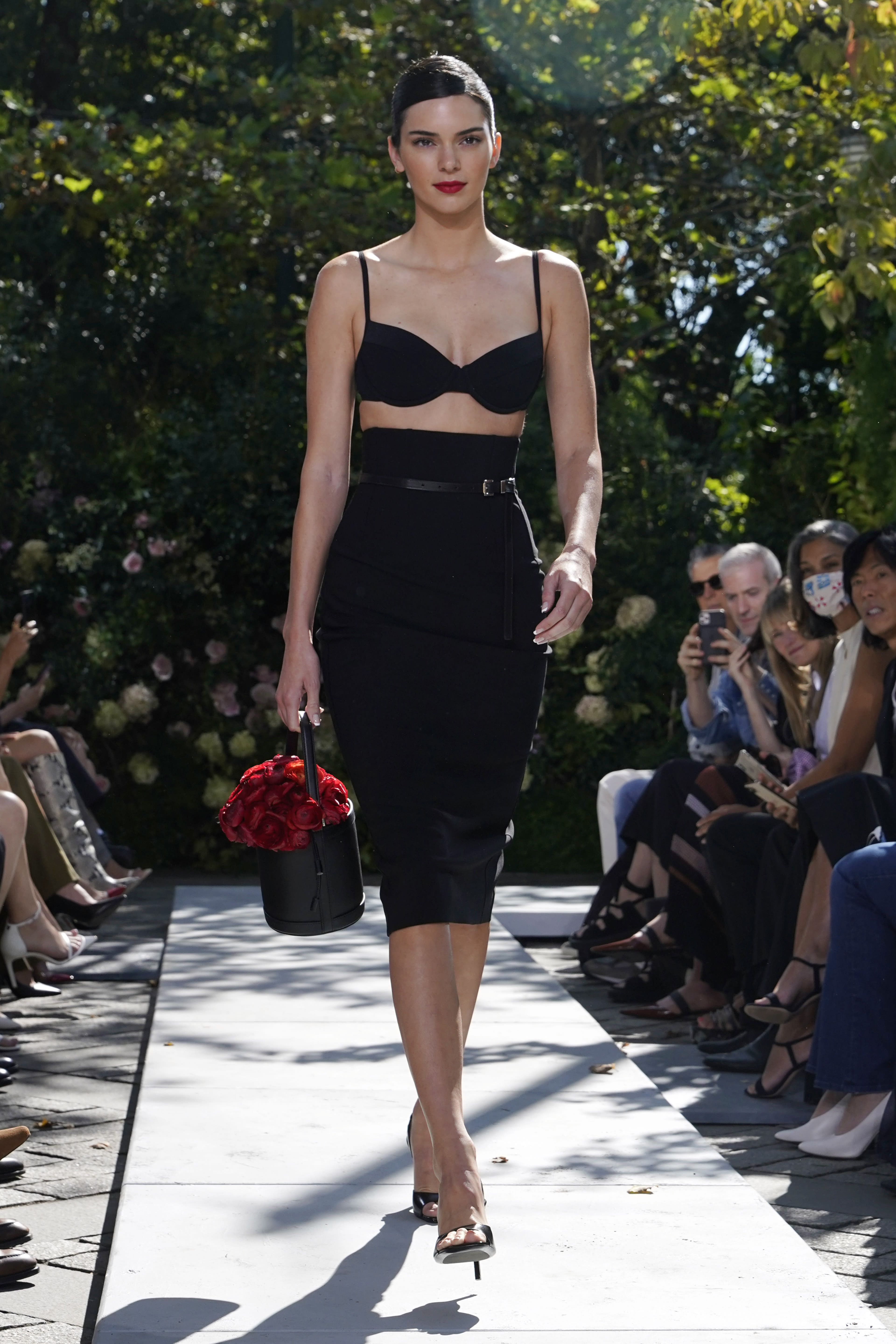 Designer Michael Kors holds first live fashion show since pandemic Designer Michael Kors holds first live fashion show since pandemic