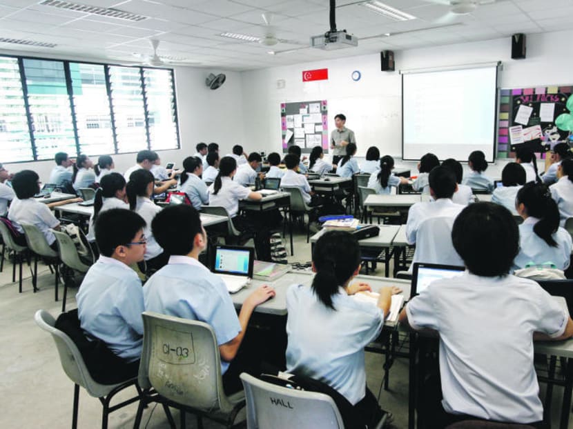 Students having a lesson in a classroom in Ngee Ann Secondary School. Photo: Ernest Chua.