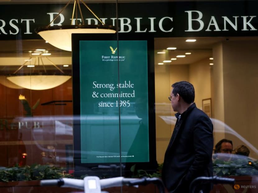 FILE PHOTO: A person walks past a First Republic Bank branch in Midtown Manhattan in New York City, New York, U.S., March 13, 2023. REUTERS/Mike Segar FILE PHOTO: A person walks past a First Republic Bank branch in Midtown Manhattan in New York City, New York, U.S., March 13, 2023. REUTERS/Mike Segar