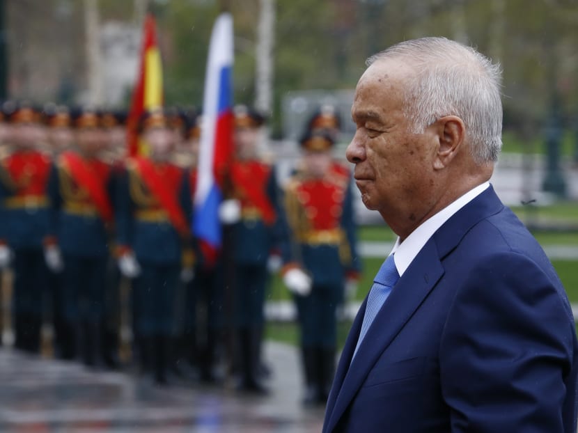 Uzbek President Islam Karimov takes part in a wreath-laying ceremony at the Tomb of the Unknown Soldier by the Kremlin Wall in Moscow, on April 26, 2016. Photo: AFP