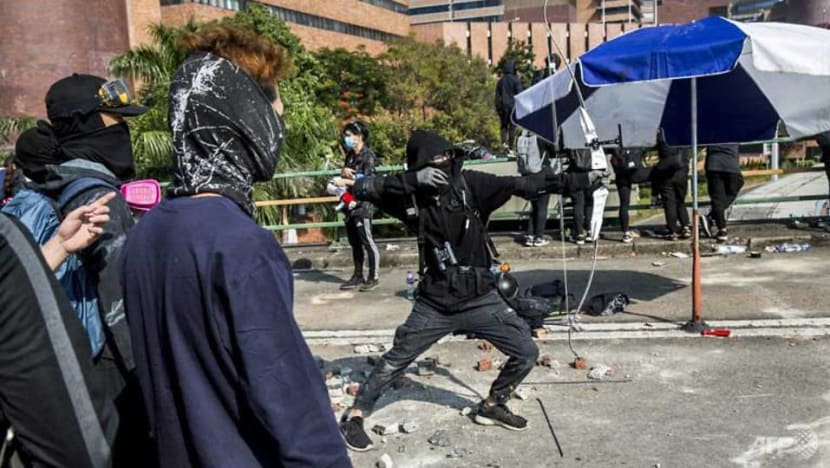 Hong Kong police warn of 'live fire' as campus protest siege deepens Hong Kong police warn of 'live fire' as campus protest siege deepens