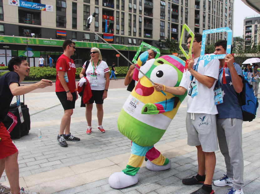Athletes at the Youth Games in Nanjing have jumped on the selfie bandwagon to capture the spirit of the 
Youth Olympics. 
Photo: Adelene Wong