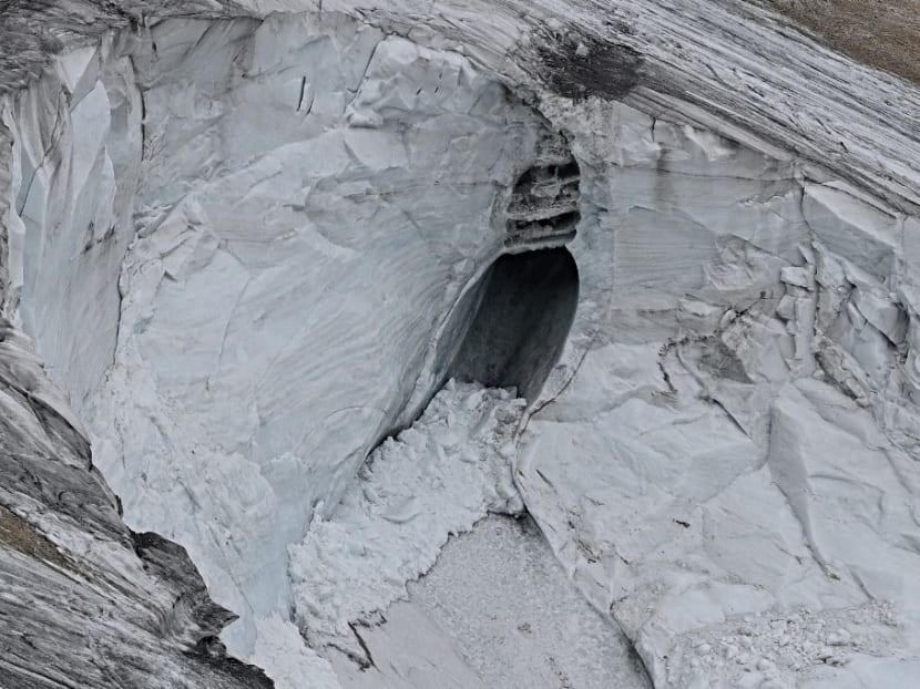 This view taken near Canazei on July 5, 2022 from a rescue helicopter, shows the Punta Rocca glacier that collapsed on the mountain of Marmolada, two days after a record-high temperature of 10°C was recorded at the glacier's summit. <br />
This view taken near Canazei on July 5, 2022 from a rescue helicopter, shows the Punta Rocca glacier that collapsed on the mountain of Marmolada, two days after a record-high temperature of 10°C was recorded at the glacier's summit. <br />
