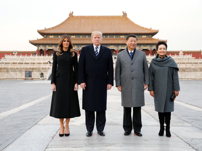 US President Donald Trump and his wife Melania visit the Forbidden City with Chinese President Xi Jinping and his wife Peng Liyuan on Wed (Nov 8), before the two leaders hold formal talks on Thursday. Photo: Reuters