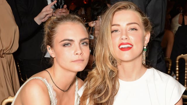 Amber Heard坐实婚内出轨　激吻Cara Delevingne照片曝光