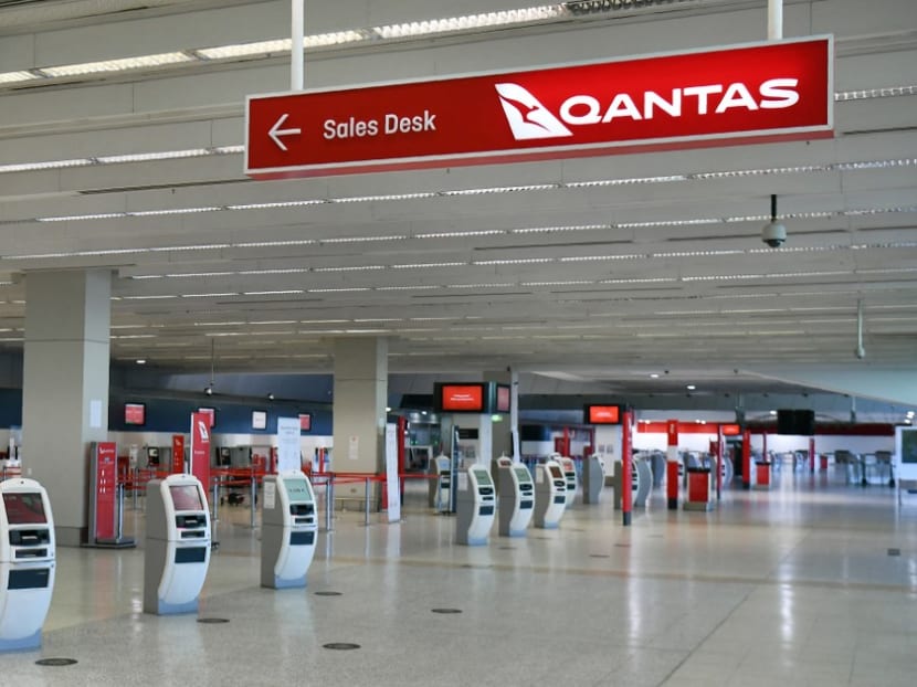 This file photo taken on August 20, 2020 shows a general view of the empty Qantas departure terminal at Melbourne Airport.