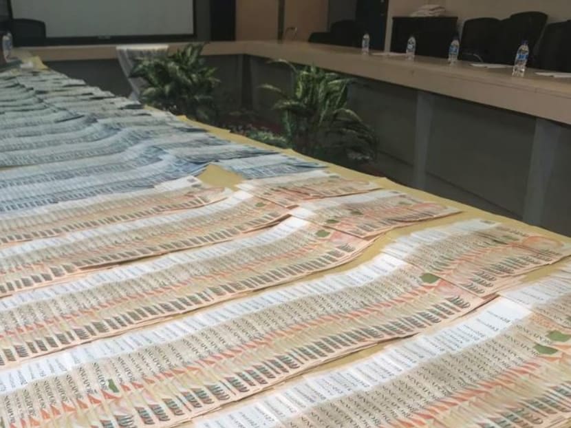 The police recovered more than S$73,500 in cash, believed to be proceeds from selling a bulk of the electronic goods, and several devices including a mobile phone, a MacBook and a Microsoft Surface Pro.