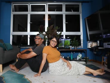 TODAY journalist Nabilah Awang and her husband in their home. 
