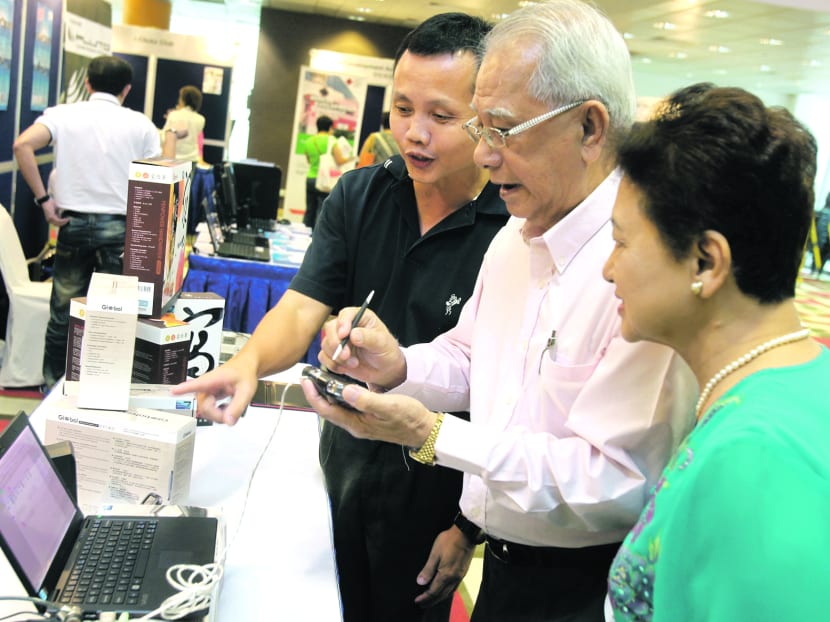 The Silver Infocomm Initiative hopes to help seniors pick up skills such as learning to use gadgets like tablets and mobile phones. TODAY file photo
