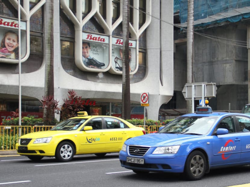 Comfort and CityCab on the road, both taxi companies belonging to ComfortDelGro Corporation Limited. TODAY file photo