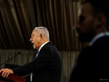Israel Prime Minister Benjamin Netanyahu speaks during an inauguration ceremony after the Adani Group completed the purchase of Haifa Port earlier in January 2023, in Haifa port, Israel January 31, 2023. REUTERS/Amir Cohen