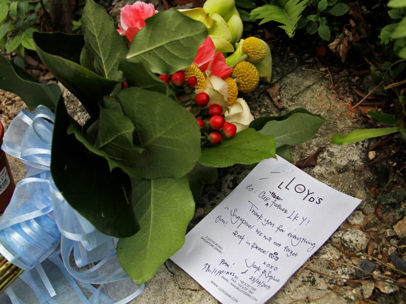 Flowers and messages left near Mr Lee Kuan Yew's residence at Oxley Road. Photo: Robin Choo