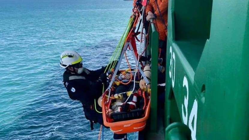 SCDF responders rescue injured marine worker from container vessel SCDF responders rescue injured marine worker from container vessel