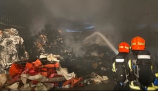 40 firefighters tackle fire involving 'large pile' of construction waste in Pioneer area