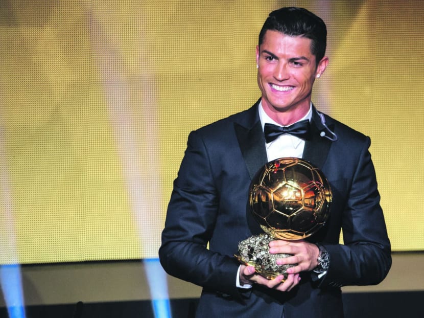 Cristiano Ronaldo with the 2014 Ballon d’Or trophy. Photo: Getty Images