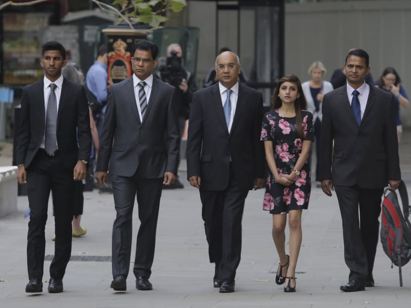 Husband of late nurse Jacintha Saldanha Benedict Barboza (second left) accompanied by his son Junal (left) daughter Lisha (second right) Labour MP Keith Vaz (centre) and an unidentified man (right) arrive for an inquest into her death, at the Royal Courts of Justice, in central London, Sept 12, 2014.  Photo: AP