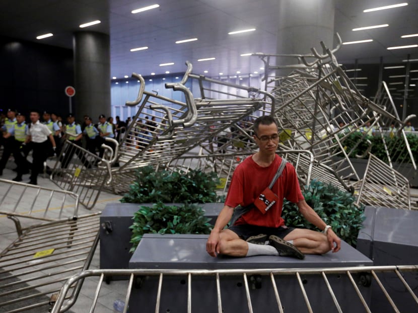 Photo of the day: A man meditates during a protest against a proposed extradition bill with China, outside the Legislative Council in Hong Kong, on June 10, 2019.