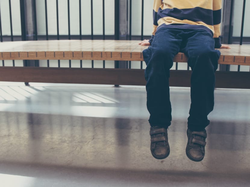 Stock image of a boy sitting on a bench. District Judge Shobha G Nair allowed a five-year-old boy’s foster parents to adopt him rather than return him to his biological mother, who has been jailed at least three times for drug-related offences and is currently at a halfway house.