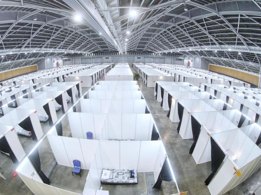 A view of a hall at the Singapore Expo Convention Hall and Exhibition Centre in Changi that is being used to house Covid-19 patients. Singapore confirmed 573 new cases of Covid-19 on Monday, the Ministry of Health said in a statement, among whom is a 52-year-old woman who worked as a healthcare volunteer at the community care facility at Singapore Expo.