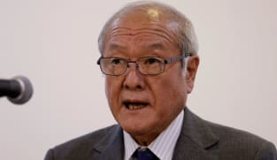 Japan's finance minister says various factors, not just rate gap, affect yen