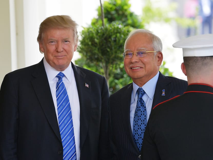 US President Donald Trump greets Malaysian Prime Minister Najib Razak outside of the West Wing of the White House. AFP file photo