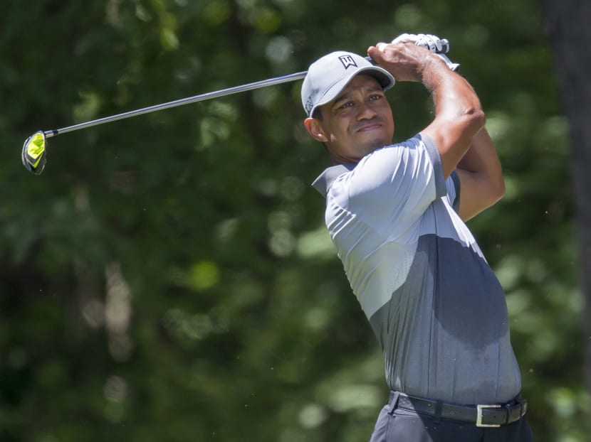 FILE - In this Saturday, Aug. 22, 2015 file photo, Tiger Woods tees off on the second hole during the third round of the Wyndham Championship golf tournament at Sedgefield Country Club in Greensboro, N.C. Photo: AP