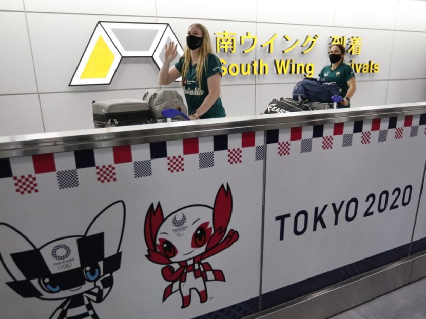 Members of Australia's Olympic softball team, the first national team to come to Japan for pre-Olympic training camp since the Tokyo 2020 Olympic Games were postponed to 2021 due to Covid-19, arrive at Narita international airport in Narita, east of Tokyo, on June 1, 2021.