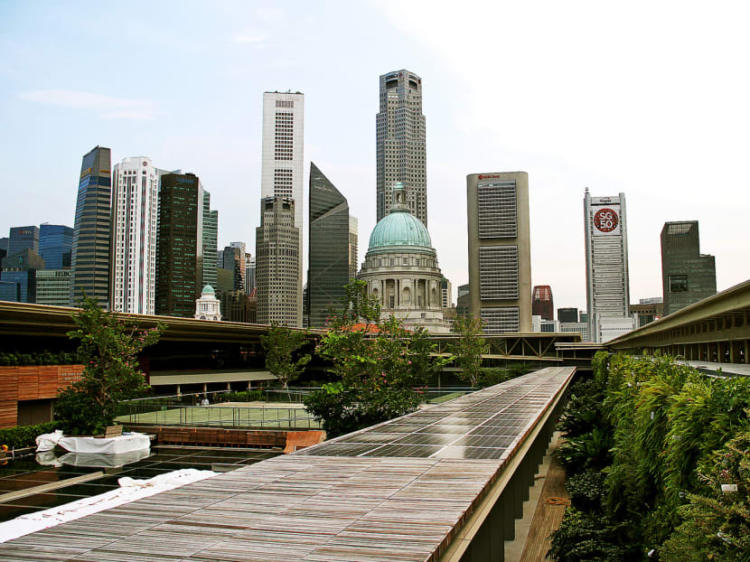 Solar panels on top of a walkway at National Gallery Singapore’s roof garden. Enhancing Singapore’s energy security via solar power is a step in the right direction. TODAY file photo