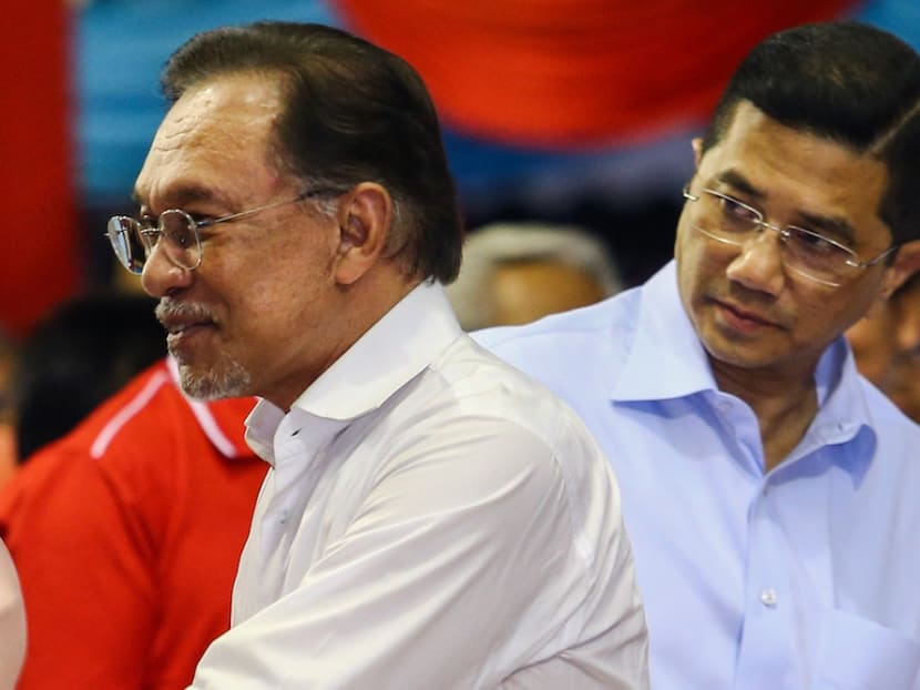 Datuk Seri Anwar Ibrahim and Datuk Seri Azmin Ali attend Parti Keadilan Rakyat’s 20th anniversary celebrations in Negri Sembilan earlier this year.