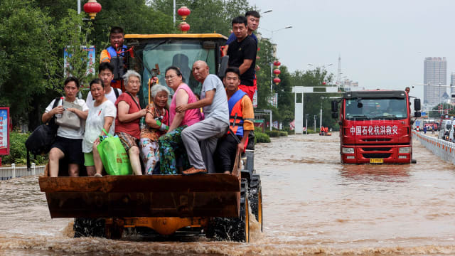 中国河南洪灾死亡人数增至73人 1300多万人受灾
