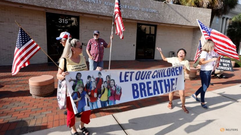 As COVID-19 surges, more Florida school districts revolt against governor's mask ban As COVID-19 surges, more Florida school districts revolt against governor's mask ban