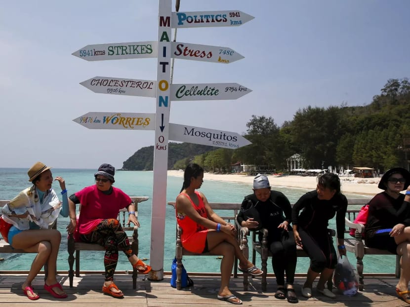 Tourists relaxing on the beaches of Phuket. Tourists relaxing on the beaches of Phuket.