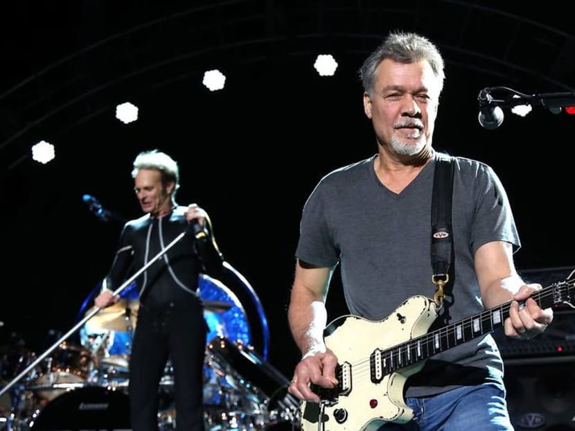 Guitars played, partly made by rock legend Eddie Van Halen go to auction