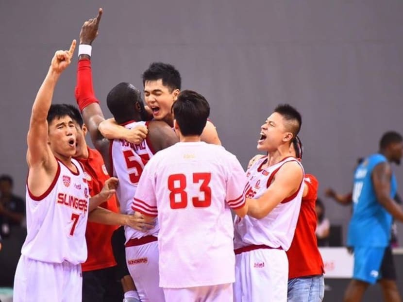 The Singapore Slingers celebrating after winning Game 4 of the ASEAN Basketball League finals against Westports Malaysia Dragons at the OCBC Arena. Both teams are now tied at 2-2. Photo: ASEAN Basketball League