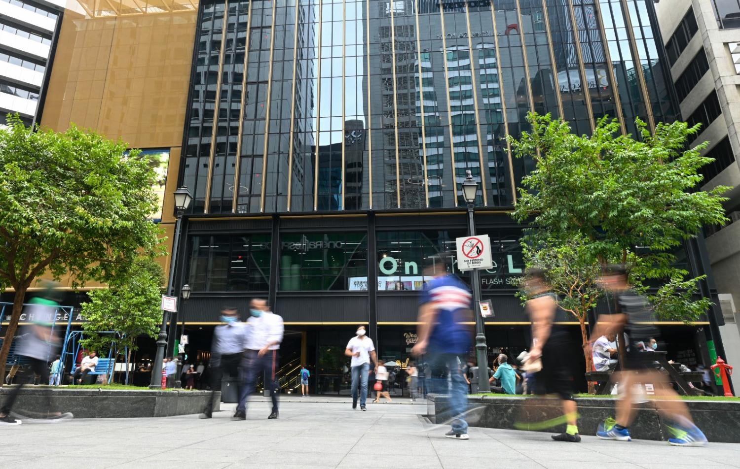 A view of the Raffles Place business district in January 2022. A view of the Raffles Place business district in January 2022.