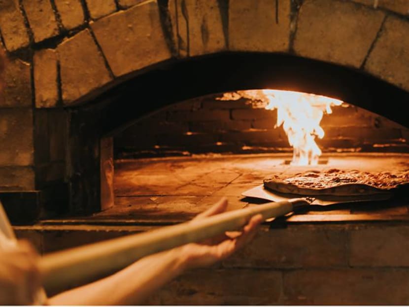 Why is the hottest restaurant in Singapore right now a pizza joint?