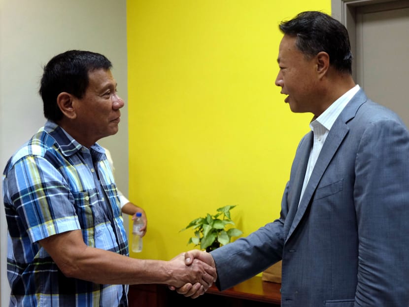 Presumptive president-elect Rodrigo Duterte (left) receives Chinese Ambassador to the Philippines Mr Zhao Jianhua during a courtesy call in Davao city. Photo: Office of the City Mayor Davao City via AP