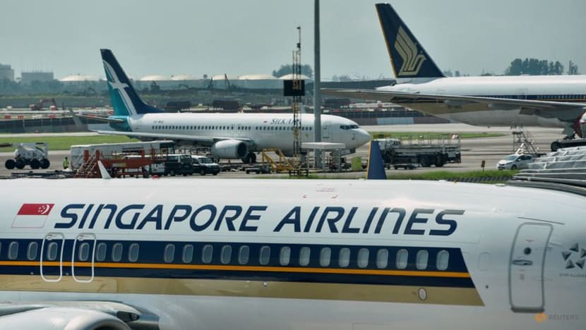 Singapore Airlines swings to profit as passenger traffic improves Singapore Airlines swings to profit as passenger traffic improves