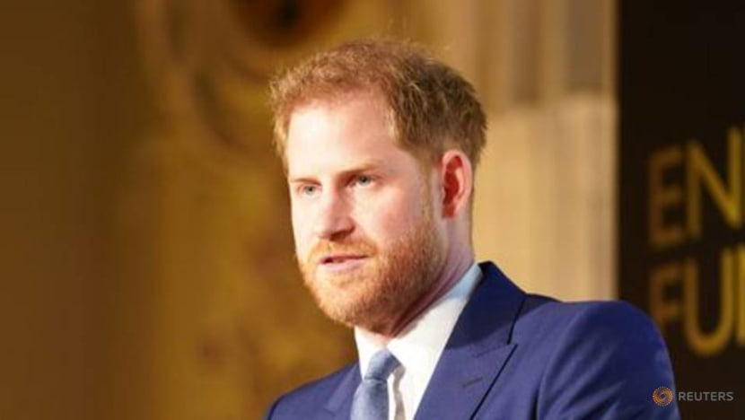 Prince Harry receives apology, damages over story saying he turned his back on Marines Prince Harry receives apology, damages over story saying he turned his back on Marines