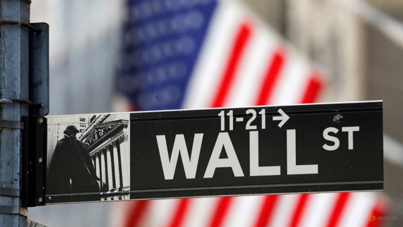 Stocks rise, dollar falls after Fed hikes as expected - CNA