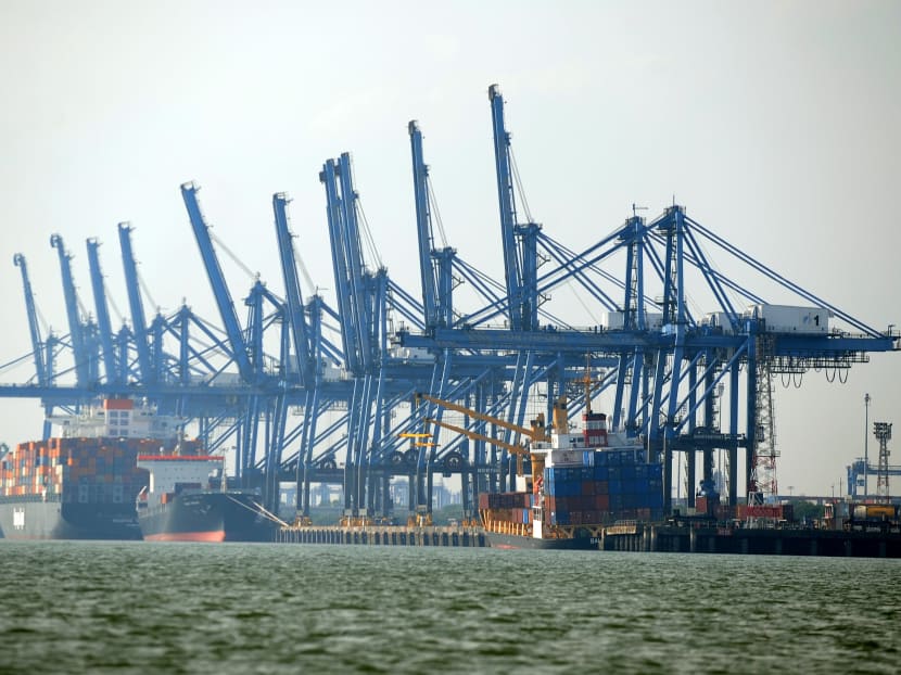 Cargo ships dock at Malaysia's Klang port on the outskirts of Kuala Lumpur on July 13, 2009. According to an official data Malaysia's exports slumped 29.7 percent in May from a year earlier, hitting their lowest level since 2001 with demand evaporating. Photo: AFP