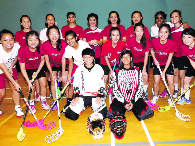 The Singapore women’s floorball team, including vice-captain Suhaidah Yusof (second row, fourth from left), will be aiming for gold at the SEA Games next month. TODAY File Photo