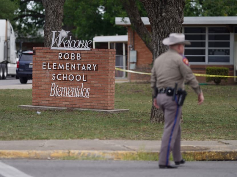 An officer walks outside of Robb Elementary School in Uvalde, Texas, on May 24, 2022. 