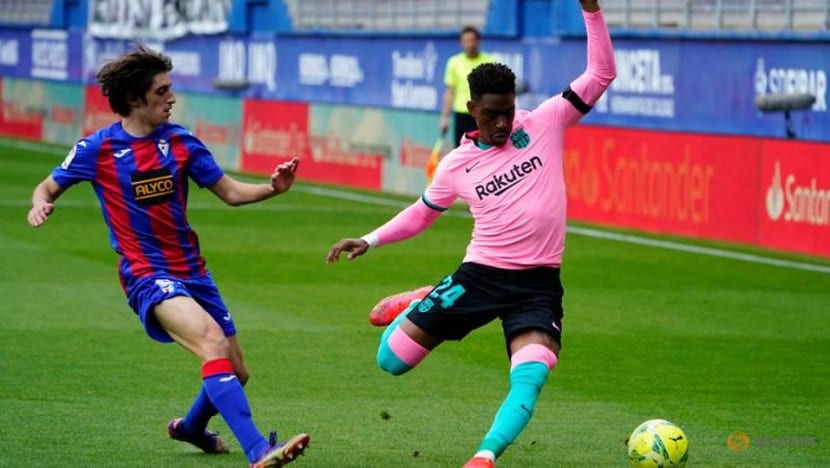 Soccer-Griezmann strike secures third place for Barca in La Liga Soccer-Griezmann strike secures third place for Barca in La Liga