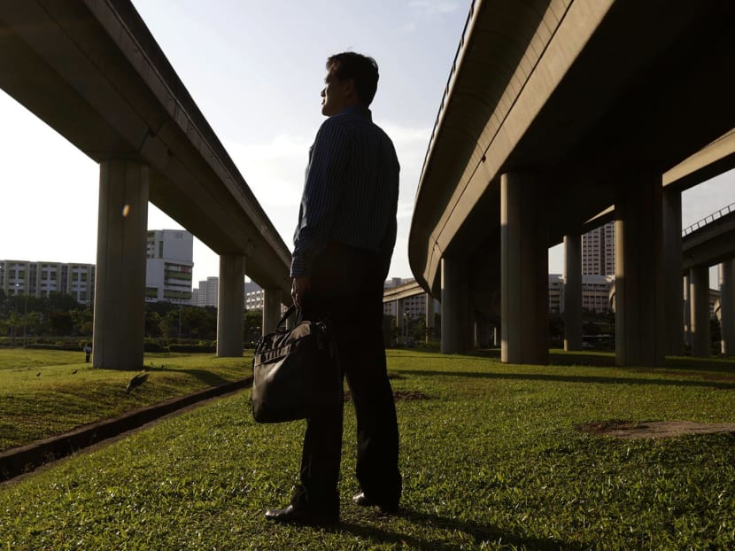 Mr Chong Kim Sem found a job as a quality assurance officer at Novartis after six months of unemployment. Photo: Wee Teck Hian/TODAY