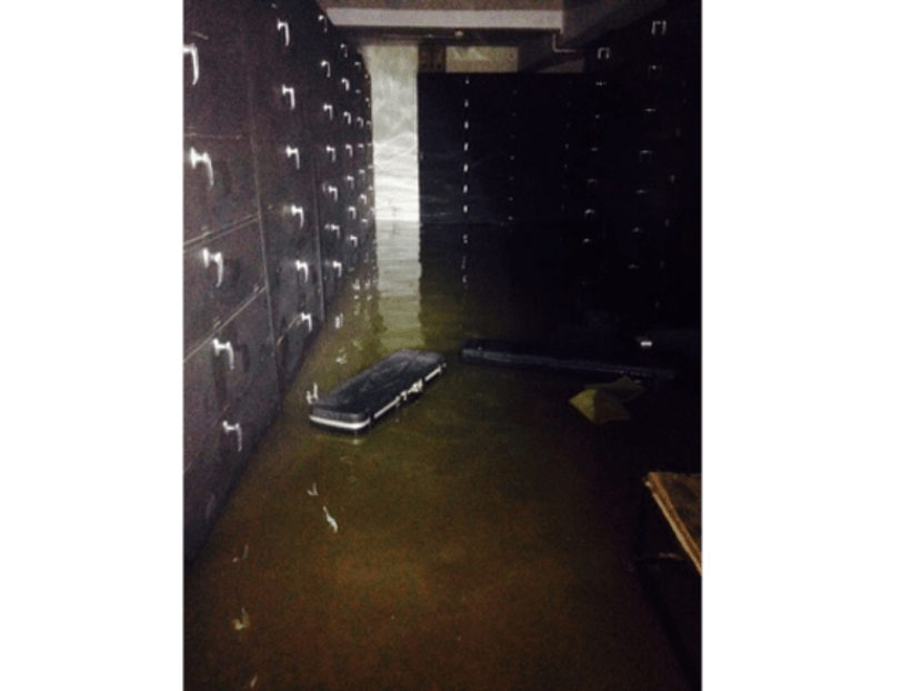 A view inside the Singapore Rifle Association's armoury after it was hit by overnight floods. Photo: Singapore Rifle Association
